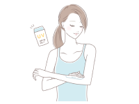 日焼け止めを塗る女性